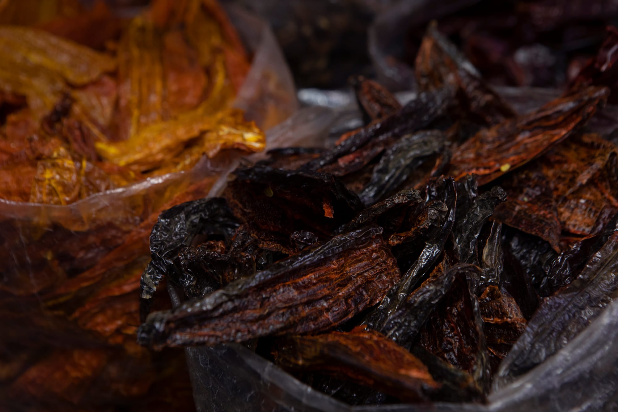 Dried peppers heaped on a Lima market stall