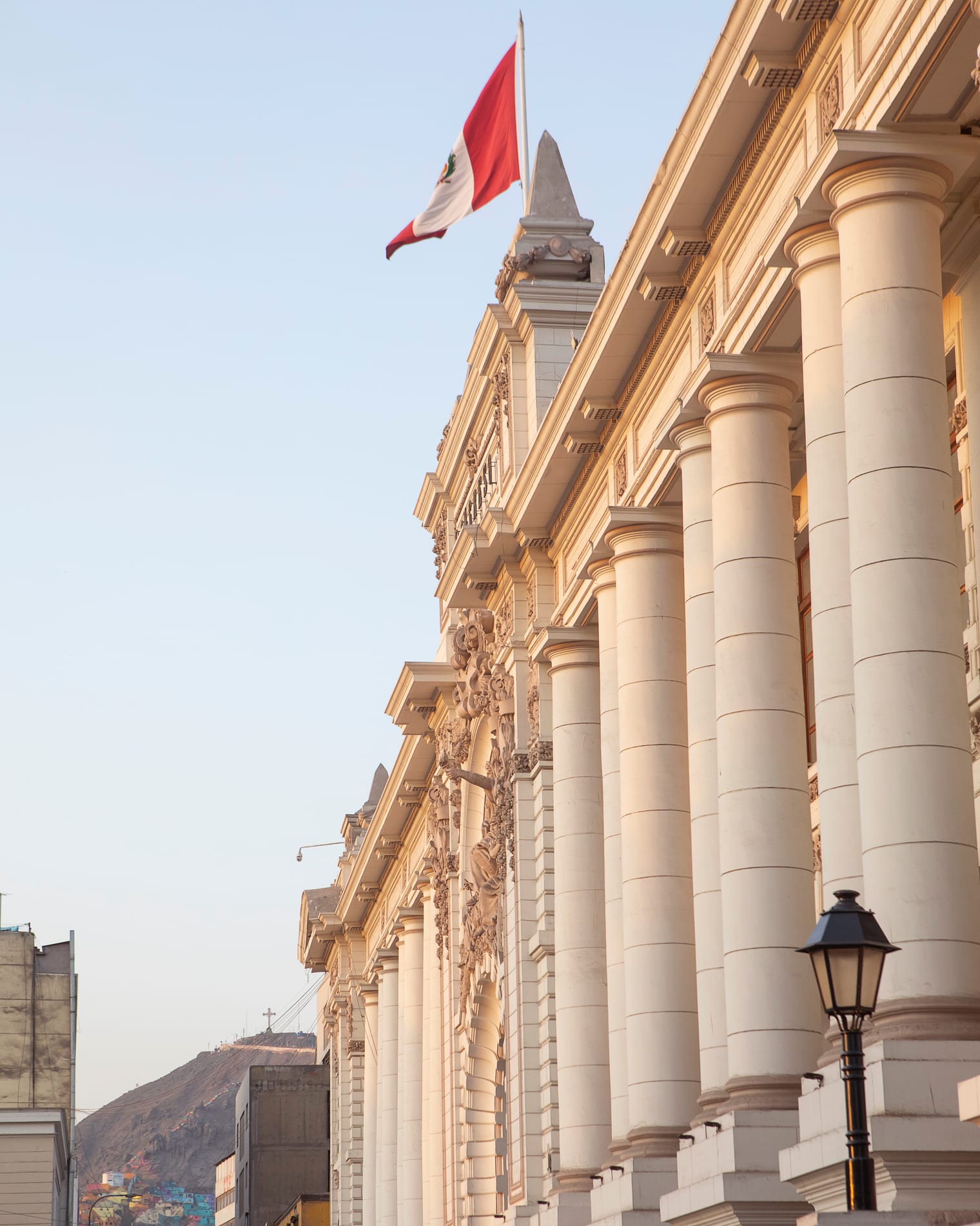 Lima’s historic center, Peruvian flag over the colonnade