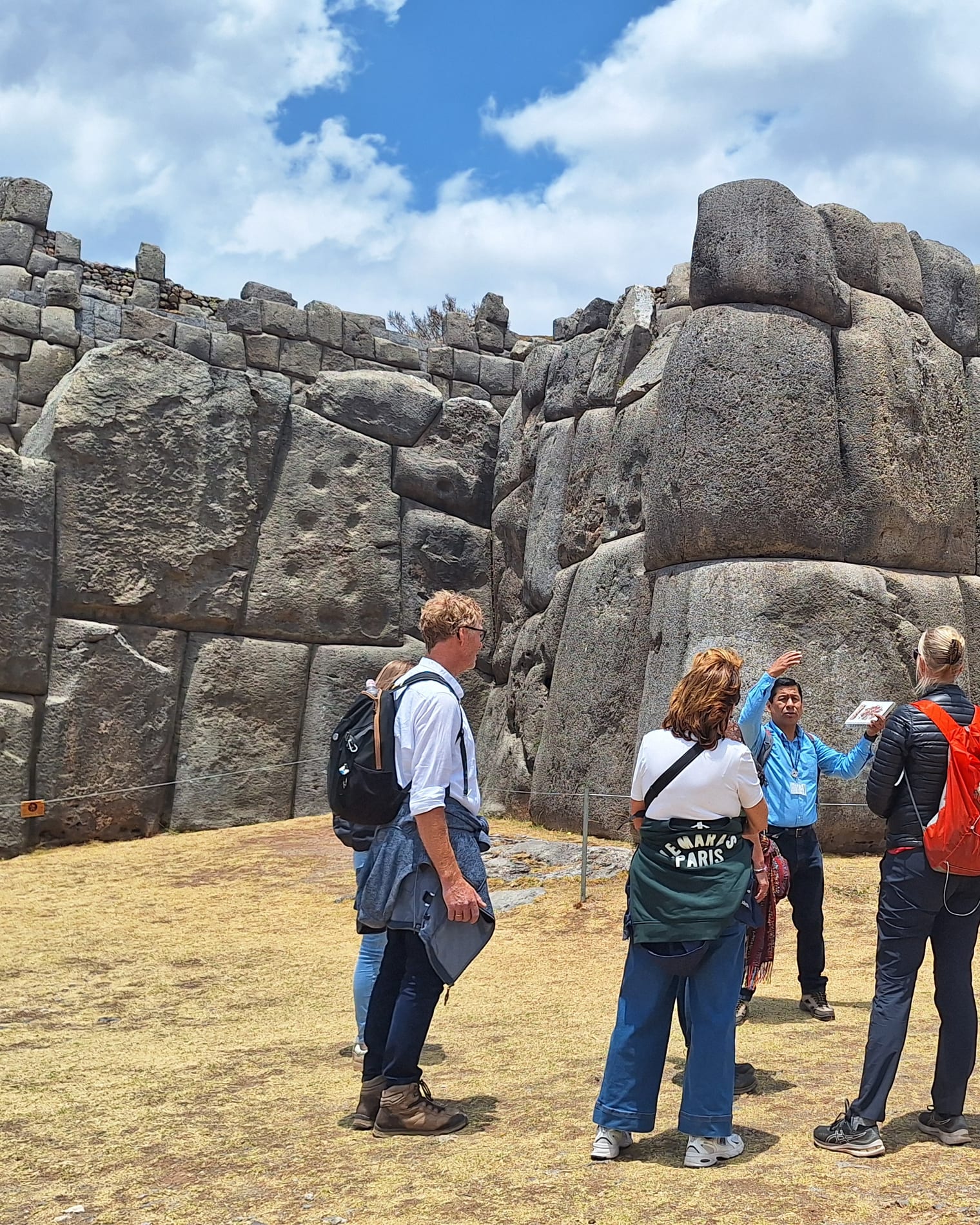 The group at the walls of Sacsayhuamán above Cusco